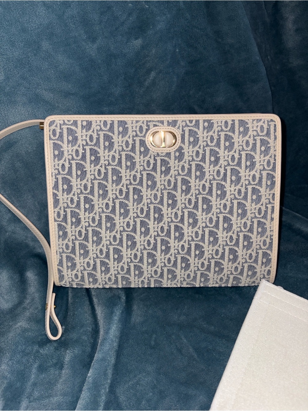 Dior blue chambray with lambskin Montaigne pouch. LIMITED EDITION